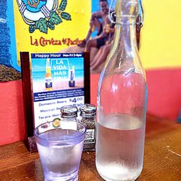 Their water is served in a bottle.
