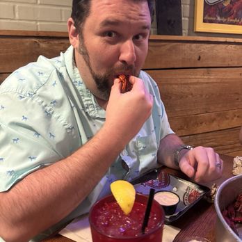 Uncle T's Oyster Bar - Jacob eating crawfish. - Bars Near Me - Scott, Louisiana