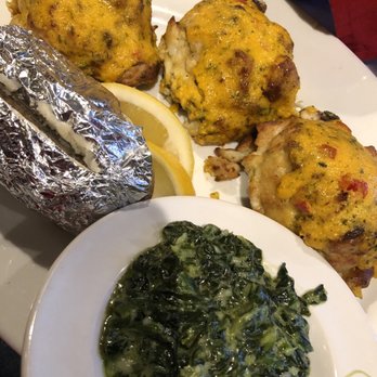 By The Docks Restaurant - Stuffed Oysters with sides of Baked Potato and Creamed Spinach. - Seafood Near Me - Middle River, Maryland By The Docks Restaurant - Stuffed Oysters with sides of Baked Potato and Creamed Spinach. - Seafood Near Me - Middle River, Maryland