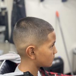 Infinite Blendz Hair Studio - Bald fade with a 3 on top, and a line up.