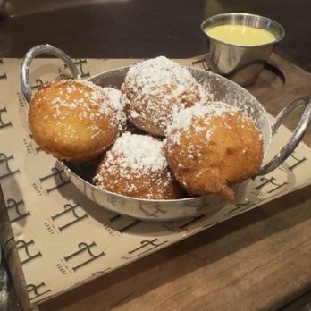 The Henry - Beignets with lemon curd - American Near Me - Las Vegas, Nevada The Henry - Beignets with lemon curd - American Near Me - Las Vegas, Nevada
