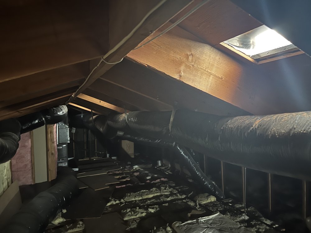 Slide of Everest Roofing