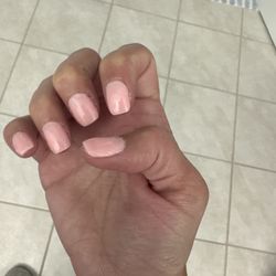 Fancy Nails - Photo taken right after service showing uncleaned cuticles, rough edges, and irritation from the manicure.