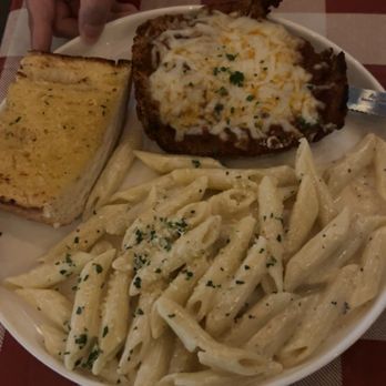Noni Vita - Chicken Parmigiana with penne pasta in Alfredo sauce - Italian Near Me - Manteca, California Noni Vita - Chicken Parmigiana with penne pasta in Alfredo sauce - Italian Near Me - Manteca, California