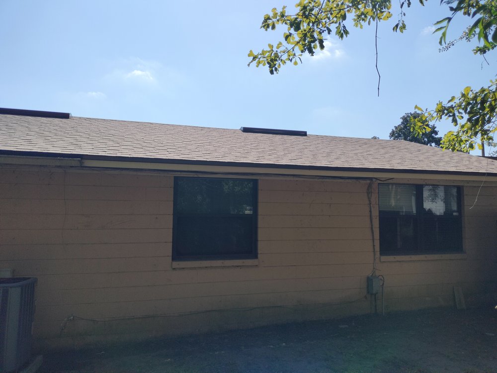 Slide of Land Roofing Company