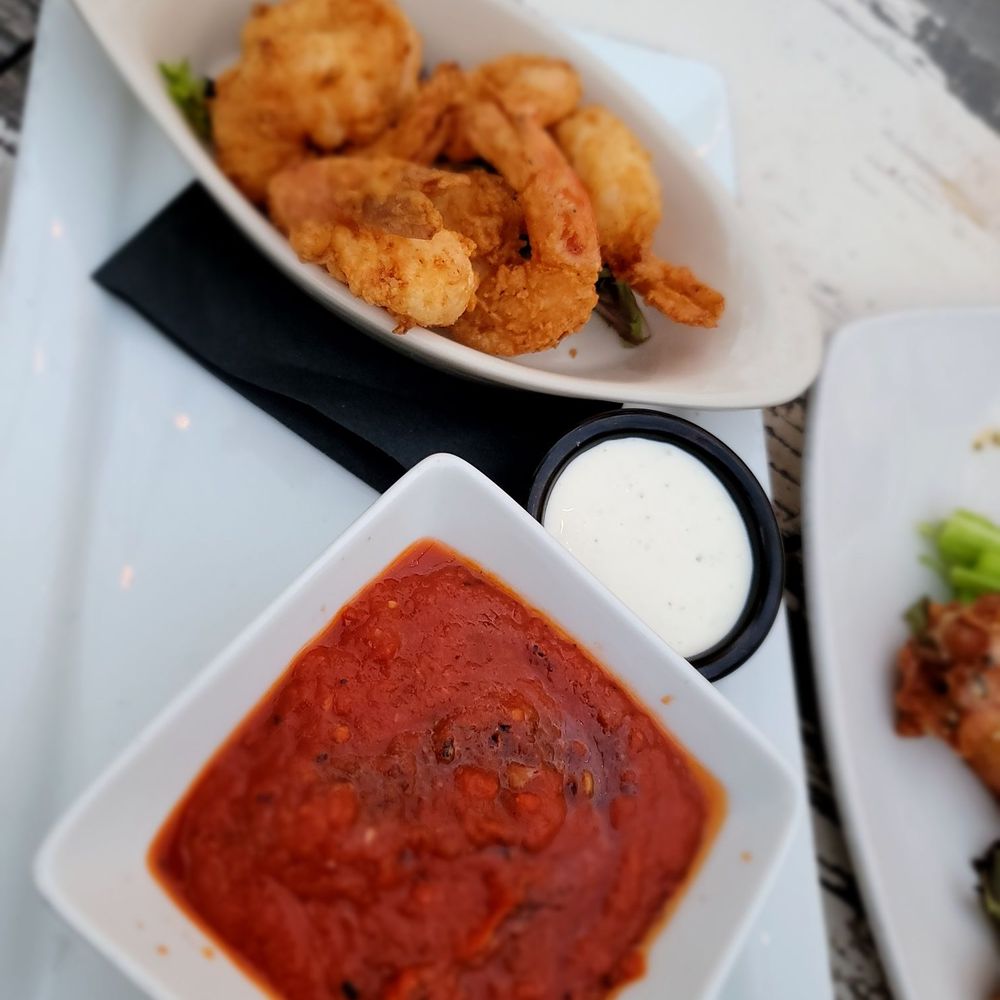 The Still Speakeasy - Crispy Shrimp with spicy red pepper sauce and Wasabi ranch - Speakeasies Near Me - Tucson, Arizona The Still Speakeasy - Crispy Shrimp with spicy red pepper sauce and Wasabi ranch - Speakeasies Near Me - Tucson, Arizona