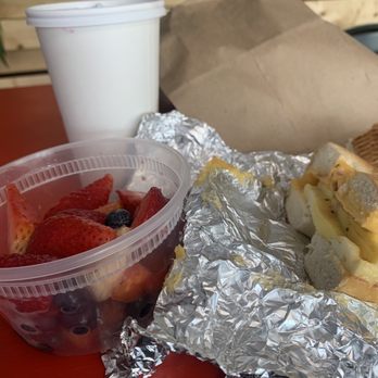 Mr Bumbles Cafe - Bagel breakfast sandwich with a fruit bowl and a much needed coffee. Definitely was delicious. - Cafes Near Me - Albany, New York