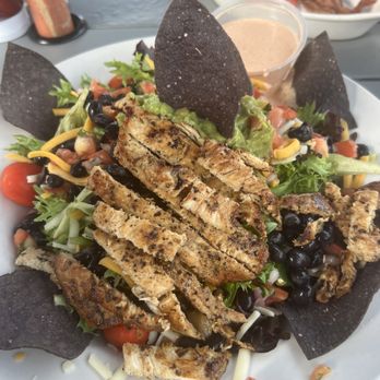 Fish House Grill - Salad with the works! Black beans, guacamole, pico de gallo and southwest ranch dressing. - Seafood Near Me - Wilmington, North Carolina Fish House Grill - Salad with the works! Black beans, guacamole, pico de gallo and southwest ranch dressing. - Seafood Near Me - Wilmington, North Carolina