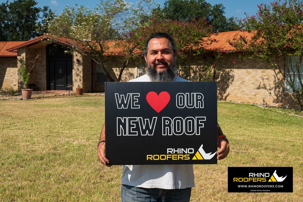 Slide of Rhino Roofers