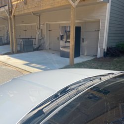 Discount Appliances - Left refrigerator on driveway pavement