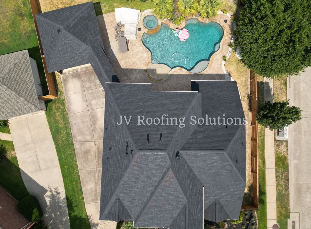 Slide of Bustamante Roofing and Construction