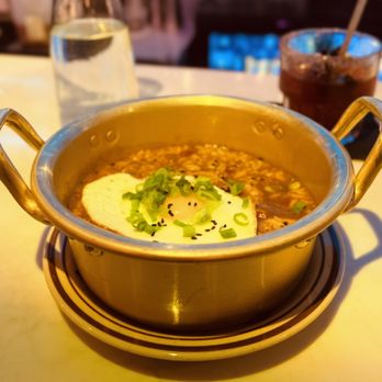Carla - Jambalaya, with egg on top. Very good, but  it is so hard to beat the Jambalaya I have had in New Orleans. - New American Near Me - New York, New York