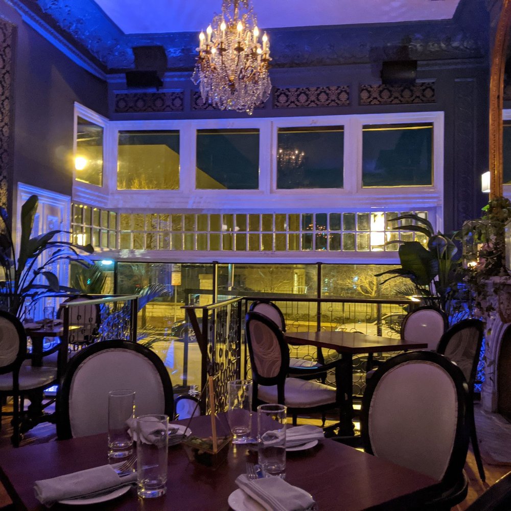 The Manor - View in the dining room to the huge windows facing Charles St. - Lounges Near Me - Baltimore, Maryland