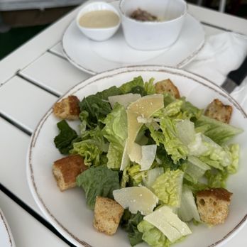 Via Rosa 11 - Caesar salad with dressing and anchovies (extra upcharge) on the side - Italian Near Me - Bainbridge Island, Washington Via Rosa 11 - Caesar salad with dressing and anchovies (extra upcharge) on the side - Italian Near Me - Bainbridge Island, Washington