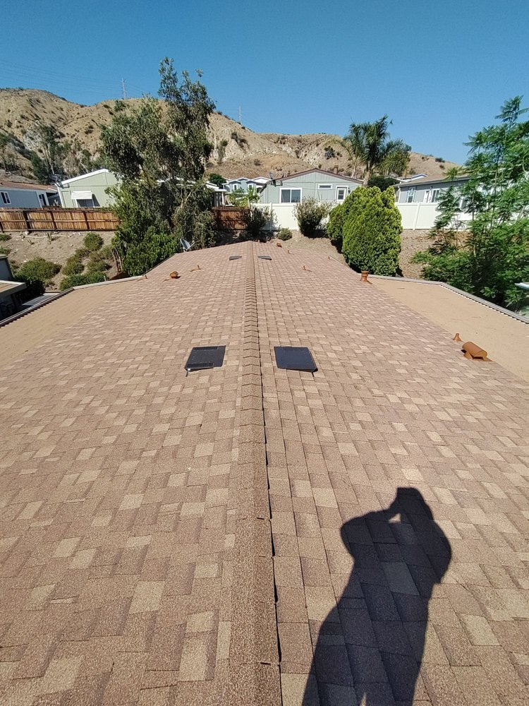 Slide of NRG Roofing