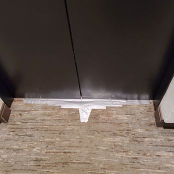 Hilton Atlanta - It's in the details: duct tape holding the carpet down outside of an elevator - Hotels Near Me - Atlanta, Georgia