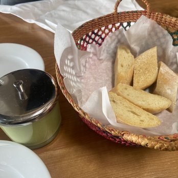 Inka Mama's - Complimentary garlic bread and salsa verde sauce - Peruvian Near Me - San Clemente, California Inka Mama's - Complimentary garlic bread and salsa verde sauce - Peruvian Near Me - San Clemente, California