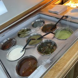 2 Hermanos Jalisco Grill - Salsa bar. Hot is black spoons