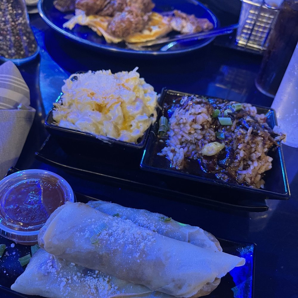 Godfreys - Jerk Chicken Eggrolls, Mac n cheese, rice and beans, and chicken and waffles: - Caribbean Near Me - Flowood, Mississippi Godfreys - Jerk Chicken Eggrolls, Mac n cheese, rice and beans, and chicken and waffles: - Caribbean Near Me - Flowood, Mississippi