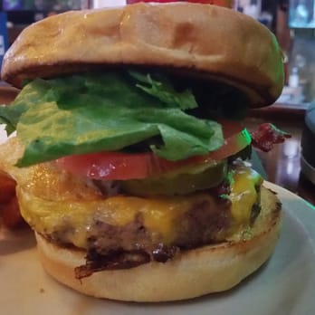The Tailgate Sports Pub - Tailgate burger, topped with an egg. - Sports Bars Near Me - Virginia Beach, Virginia The Tailgate Sports Pub - Tailgate burger, topped with an egg. - Sports Bars Near Me - Virginia Beach, Virginia