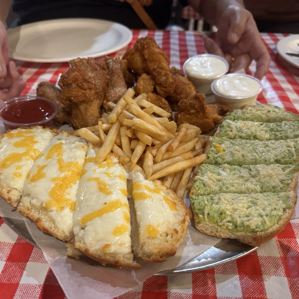 Brick Oven Pizza - NFL Football Special, 10 wings (2 flavors), cheesey bread, artichoke bread, fries. $39.99 on M, Th, Sun. - Pizza Near Me - Kalaheo, Hawaii Brick Oven Pizza - NFL Football Special, 10 wings (2 flavors), cheesey bread, artichoke bread, fries. $39.99 on M, Th, Sun. - Pizza Near Me - Kalaheo, Hawaii