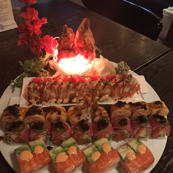 Okinii - New Years roll, Crazy Tuna, Tropical and Spicy Girl - Sushi Bars Near Me - New York, New York Okinii - New Years roll, Crazy Tuna, Tropical and Spicy Girl - Sushi Bars Near Me - New York, New York