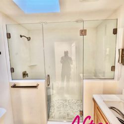 American Glass & Window - Frameless Shower Enclosure