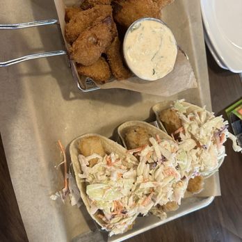 Neptunes Taphouse and Eatery - Fish tacos (cod) with fried artichokes. - American Near Me - Livingston, Montana Neptunes Taphouse and Eatery - Fish tacos (cod) with fried artichokes. - American Near Me - Livingston, Montana