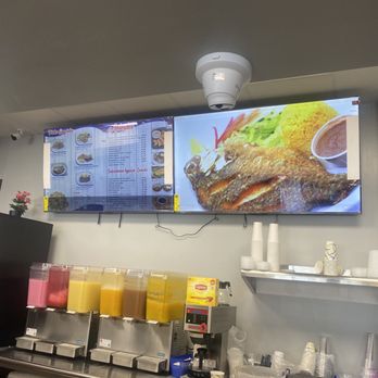 Doña Bessy Pupuseria - a large television mounted on the wall - Diners Near Me - Manassas, Virginia Doña Bessy Pupuseria - a large television mounted on the wall - Diners Near Me - Manassas, Virginia