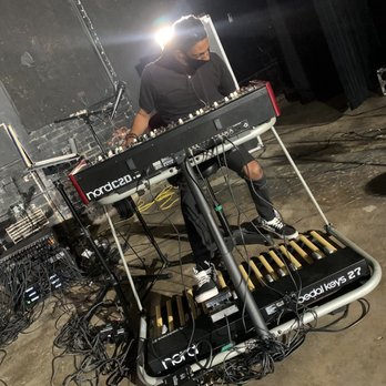 Durham Fruit and Produce Company - a man sitting at a keyboard - Music Venues Near Me - Durham, North Carolina Durham Fruit and Produce Company - a man sitting at a keyboard - Music Venues Near Me - Durham, North Carolina