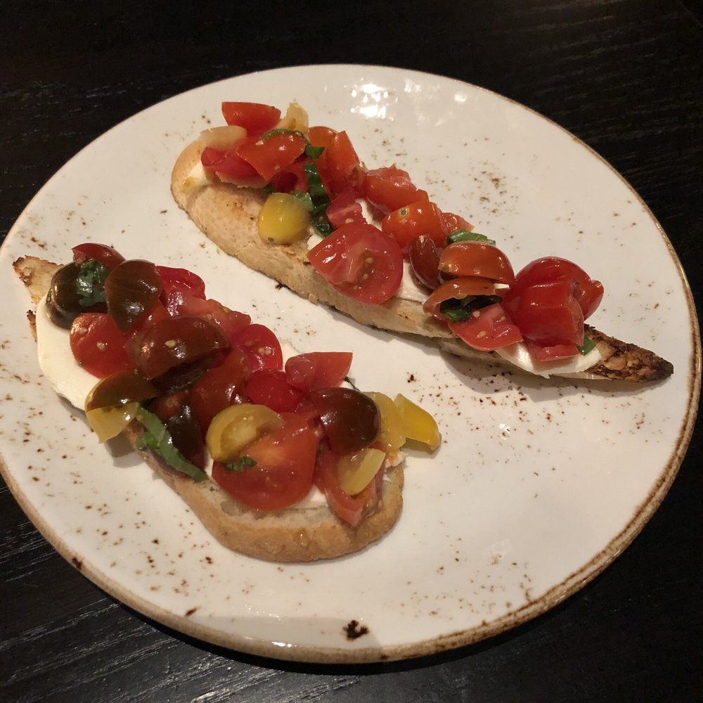 Red Rabbit St. Paul - heirloom tomato toasts (heirloom tomatoes, basil, fresh mozzarella, evoo, served on toast) - Italian Near Me - St Paul, Minnesota