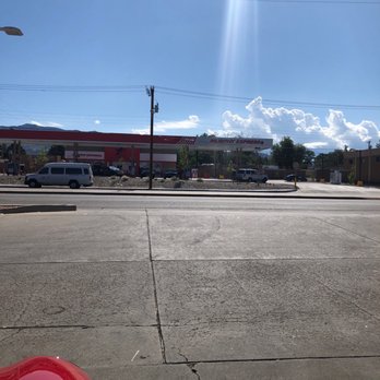Murphy Express - a red fire hydrant in a parking lot - Gas Stations Near Me - Albuquerque, New Mexico