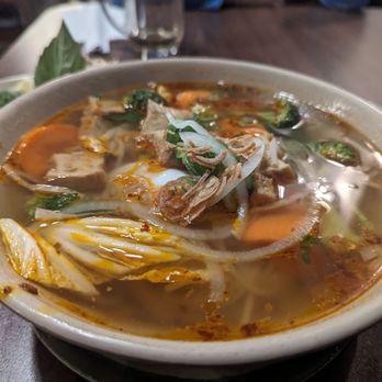 Pure Delight Café - a bowl of soup on a table - Vietnamese Near Me - Vancouver, British Columbia Pure Delight Café - a bowl of soup on a table - Vietnamese Near Me - Vancouver, British Columbia