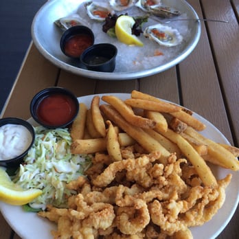 The Beachead - Clam fritters with fries and the one buck shuck oysters! - Seafood Near Me - Block Island, Rhode Island