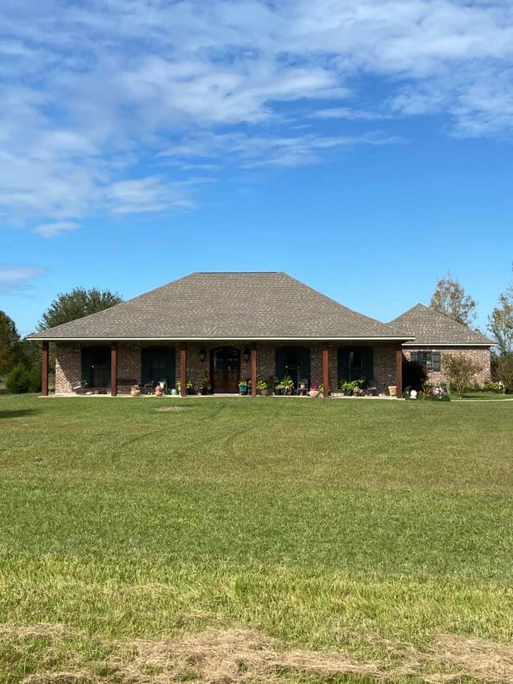 Slide of John Theriots Roofing