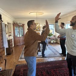 Lots of high-fives here. It's like a sports team where everyone rises together.