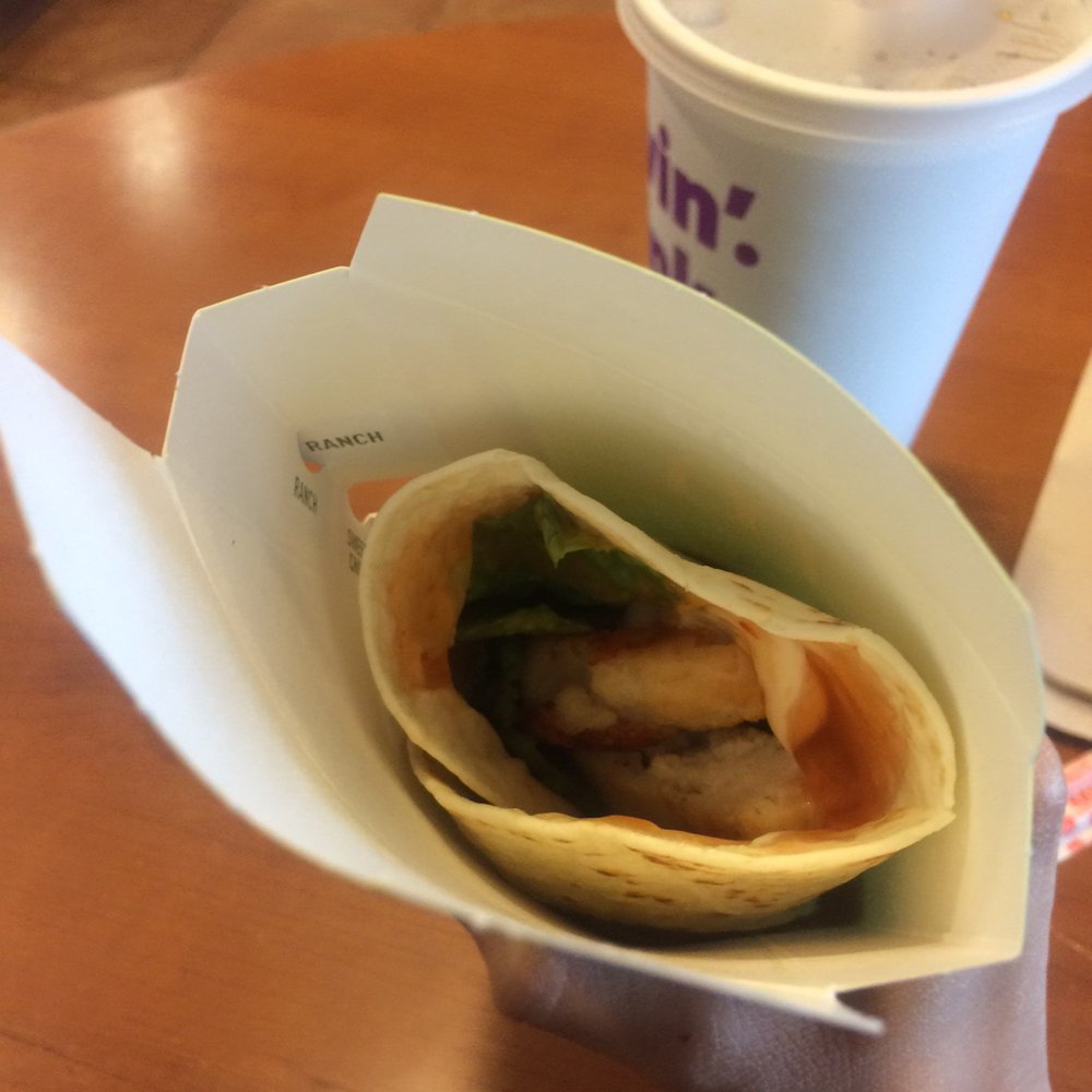 McDonald's - a person holding a taco and a drink - Burgers Near Me - Prosser, Washington McDonald's - a person holding a taco and a drink - Burgers Near Me - Prosser, Washington