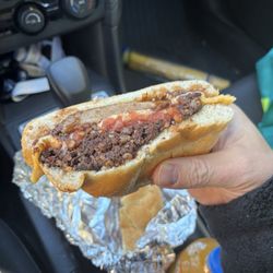 Tierney Fine Foods - Irish sausage, puddings, grilled tomato and cheese on a roll with chef sauce.