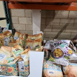 Costco Wholesale - KS tortilla chips $0.15 per oz. Clear cost winner.