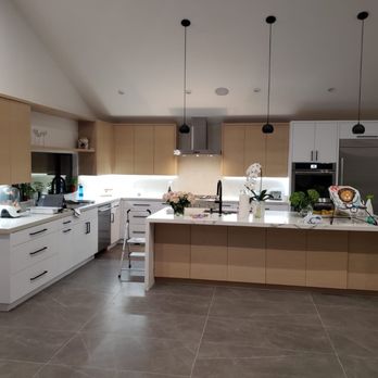 ONEderful Construction - a kitchen with a center island - General Contractors Near Me ONEderful Construction - a kitchen with a center island - General Contractors Near Me