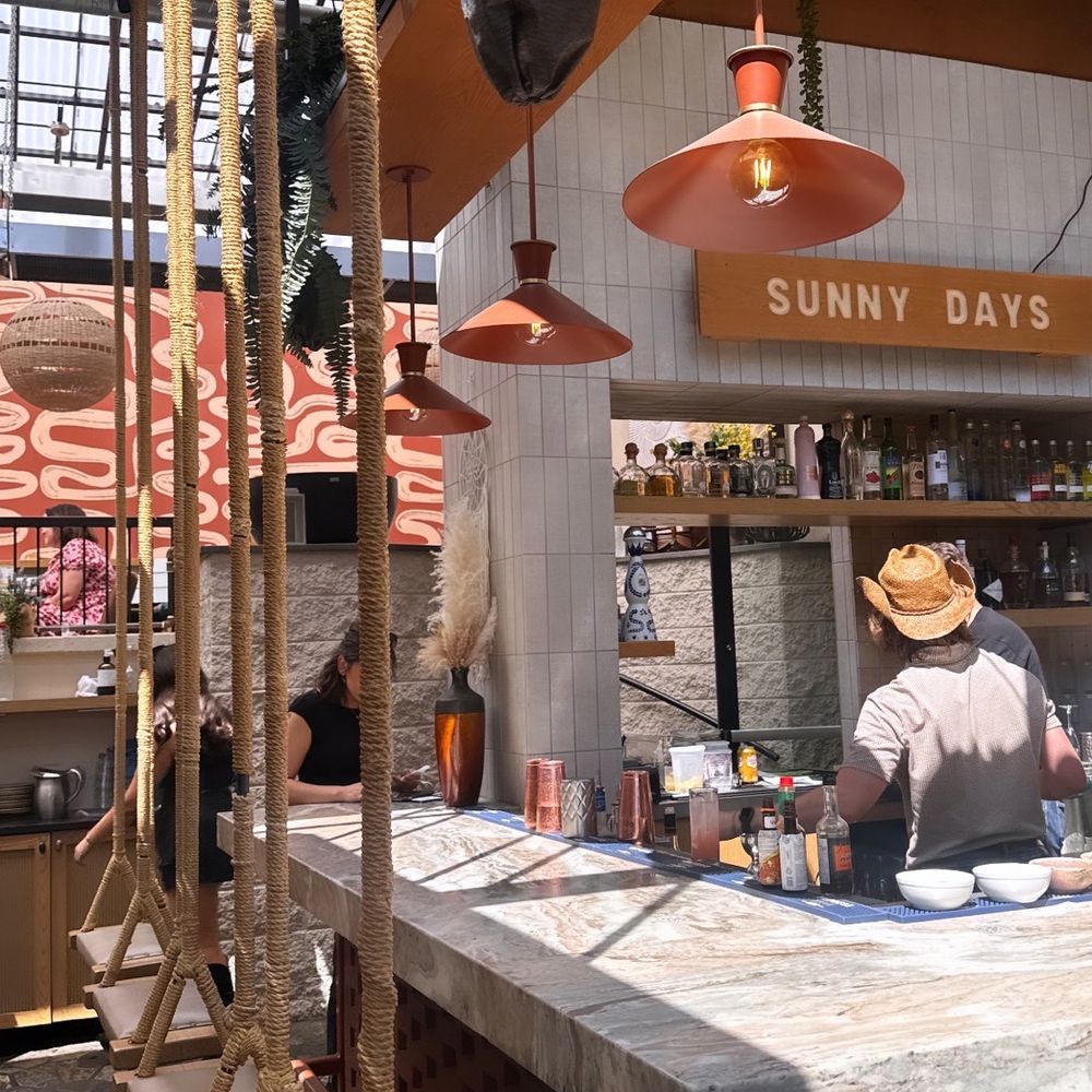 Porch - Bar seating with swings - Comfort Food Near Me - Calgary, Alberta Porch - Bar seating with swings - Comfort Food Near Me - Calgary, Alberta