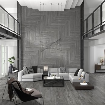 Porcelanosa - a modern living room with wood floors - Kitchen & Bath Near Me - Denver, Colorado