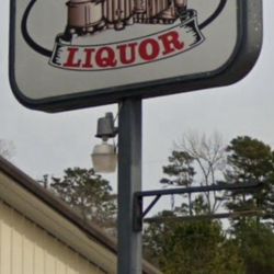 The House of Liquor - Sign alongside highway