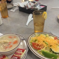 Melody Gardens Restaurant & Skateland - The chicken dumpling soup is on the left and the tossed salad without dressing is on the right.