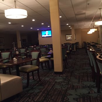 Midlo Bistro - tables and chairs in a restaurant - American Near Me - Richmond, Virginia Midlo Bistro - tables and chairs in a restaurant - American Near Me - Richmond, Virginia