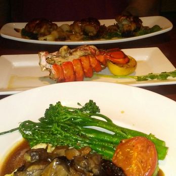 Seasons 52 - Filet Mignon topped w/mushrooms on a bed of potatoes.. Grilled lobster tail & grilled Wild Quail.. Absolutely mouth-watering.. - Wine Bars Near Me - Cherry Hill, New Jersey