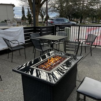 Mia Cafe and Wine Bar - Nice fire pit out back with view of Lk Washington - Wine Bars Near Me - Kirkland, Washington