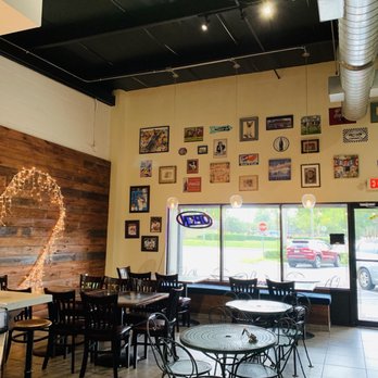 West Orange Creamery - Seating area in front of shop. - Desserts Near Me - Ocoee, Florida West Orange Creamery - Seating area in front of shop. - Desserts Near Me - Ocoee, Florida