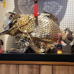 The famous fish sculpture next to my favorite table