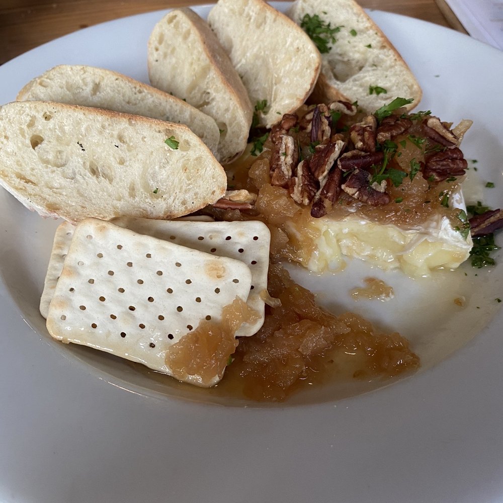 Rustic Table - Brie app with Mac and cheese in the background - Southern Near Me - Pawleys Island, South Carolina Rustic Table - Brie app with Mac and cheese in the background - Southern Near Me - Pawleys Island, South Carolina
